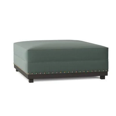 Alexie Ottoman Red Barrel Studio Body Fabric: Sachi Laguna - Leg Color: Espresso