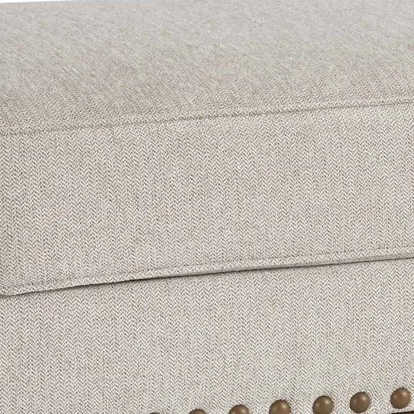 Benjara BM206321 Nailhead Trim Fabric Upholstered Ottoman with Turned Legs Light Gray