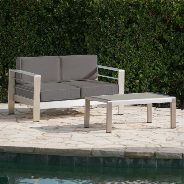 Cybele Doris Outdoor Silver Aluminum Loveseat and Coffee Table Set with Water Resistant Cushions, Light Teal