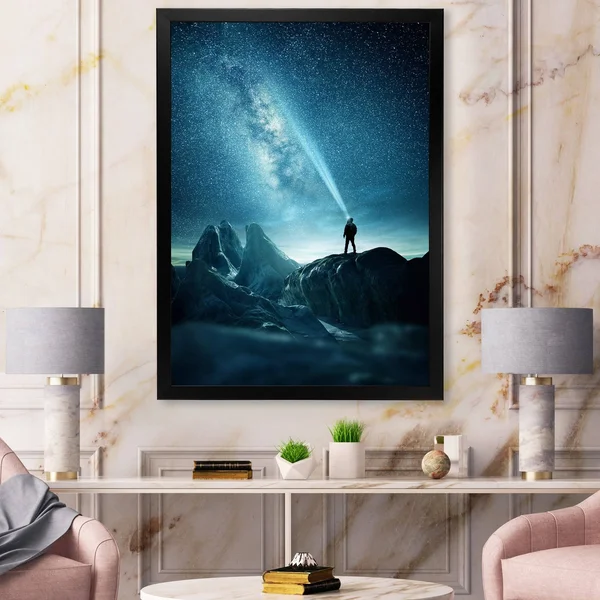 Designart 'A Man Shining A Light Into The Night Sky' Modern Framed Art Print - 30 in. Wide x 40 in. High - Black