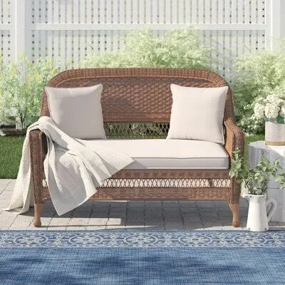 Armbruster Loveseat with Cushions Bay Isle Home Frame Color: Honey, Cushion Color: Tan